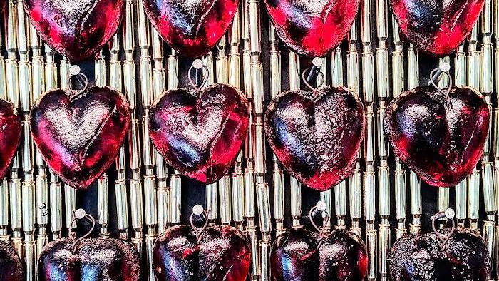 Artist tallies New Orleans’ murder rate, with glass hearts and 5,000 bullet casings